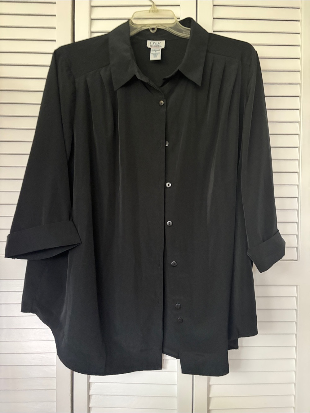 An easy wear, easy care top in black